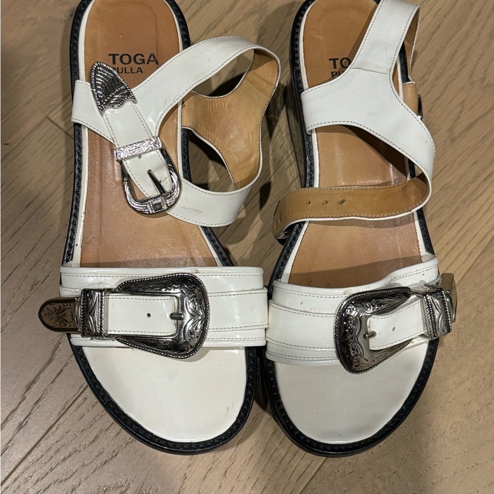 Toga Pulla White sandals with classic Toga metal buckle.